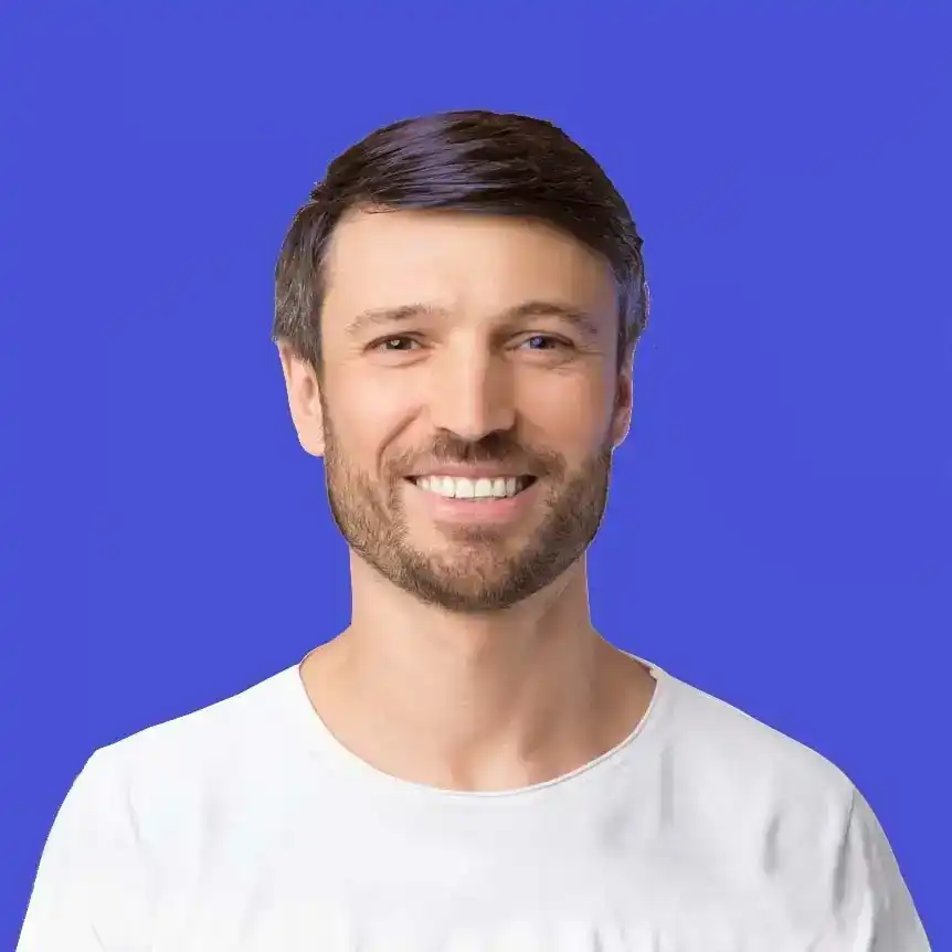 A smiling man representing a successful patient recovery journey at Impireum Wellness.