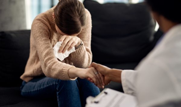 depressed-woman-seeking-solace-from-her-psychotherapist depressed-woman-seeking-solace-from-her-psychotherapist